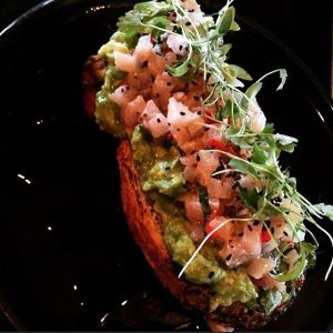 Kingfish Sashimi and Smashed Avo on freshly baked seeded bread...